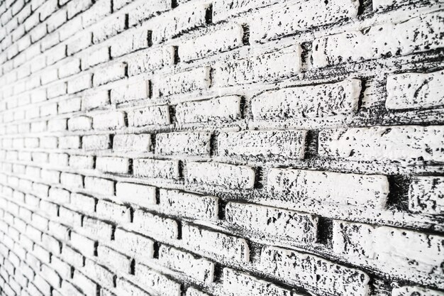 Mur de briques blanches et grises