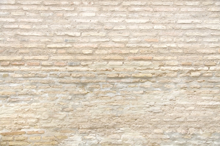 Photo gratuit mur de briques de couleur claire