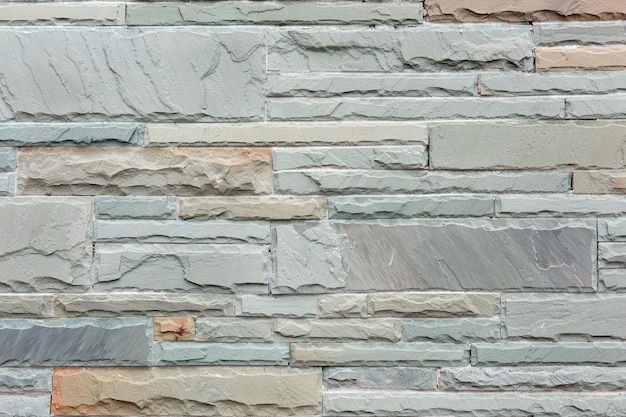 Mur de briques de grès blanc fond texturé