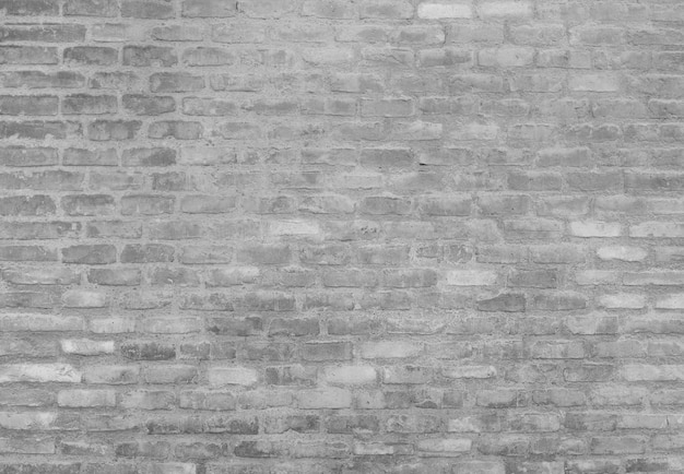 Photo gratuite mur de briques gris