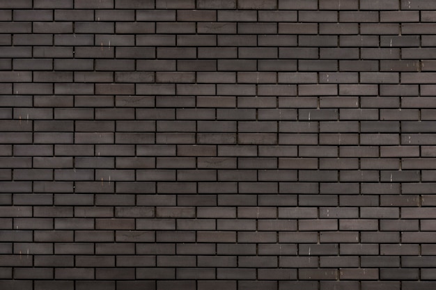 Mur de briques grises fond texturé
