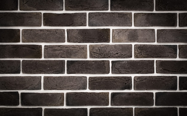 Photo gratuite mur de briques marron foncé