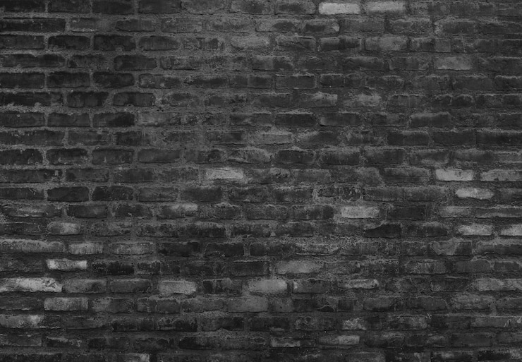 Photo gratuit mur de briques noir