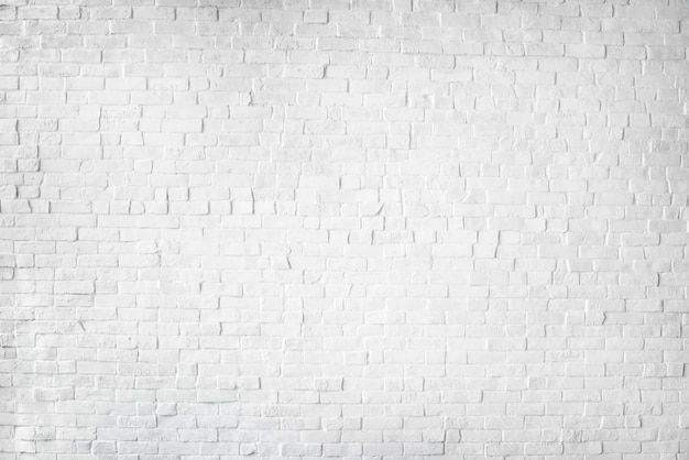 Photo gratuite mur de briques peintes en blanc