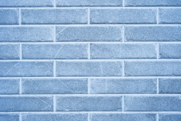 Mur de briques. Texture de brique grise avec remplissage blanc