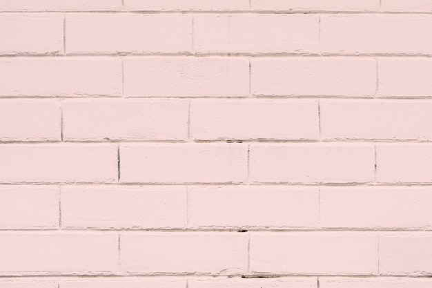 Mur de briques texturées rose