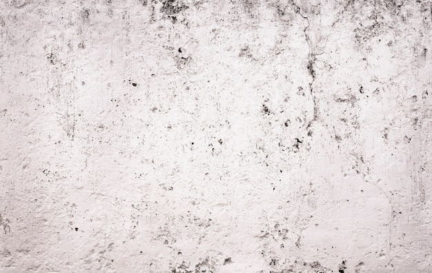 Mur fissuré en ciment blanc