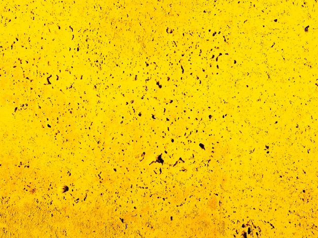 Mur jaune patiné texturé
