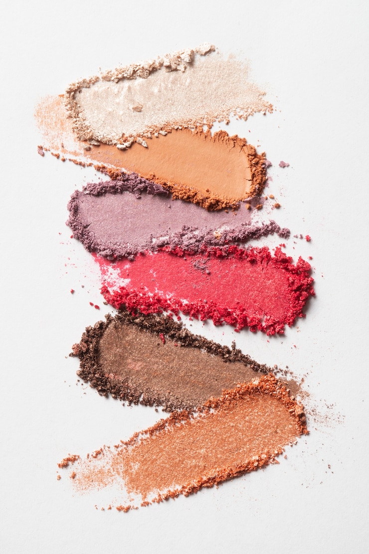 Photo gratuit nature morte de combinaison de textures de maquillage