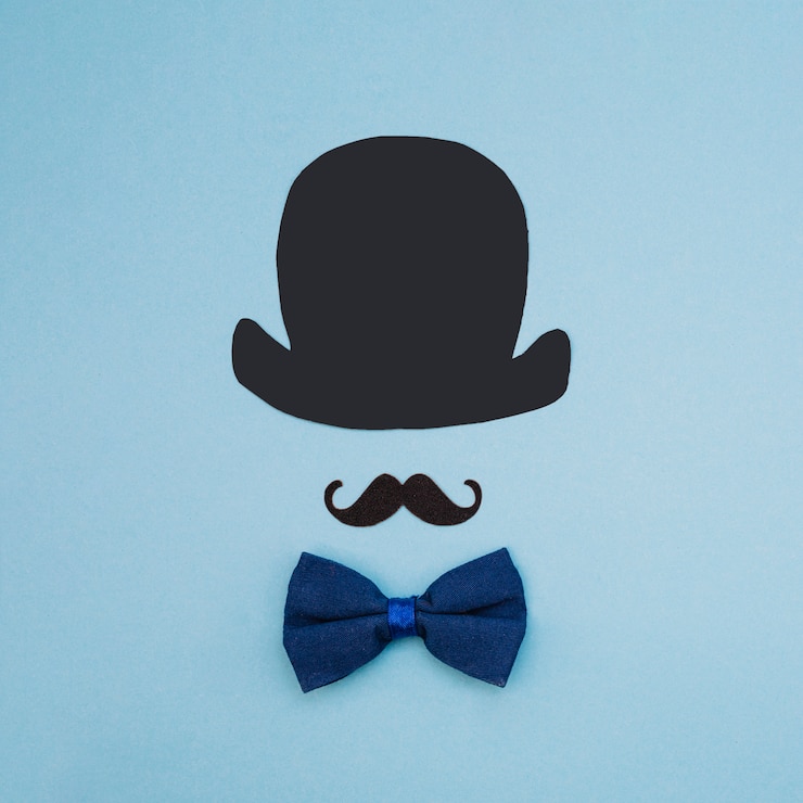 Photo gratuit noeud papillon près de moustache ornementale et chapeau haut de forme