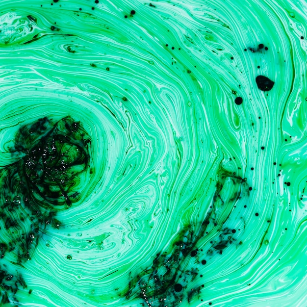 Nuances de vert formant un vortex