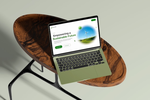 Un ordinateur portable avec une page d'accueil écologique sur une table à café