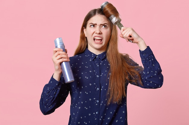 Outraged Caucasian woman has furry expression