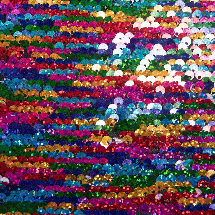 Photo gratuit paillettes multicolores lumineuses en arrière-plan