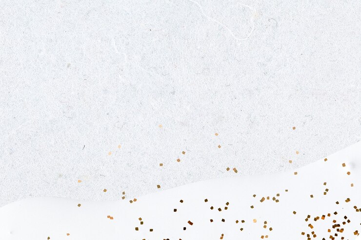 Photo gratuit paillettes d'or sur fond blanc abstrait