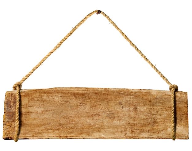 Photo gratuite panneau en bois suspendu à un clou rouillé.
