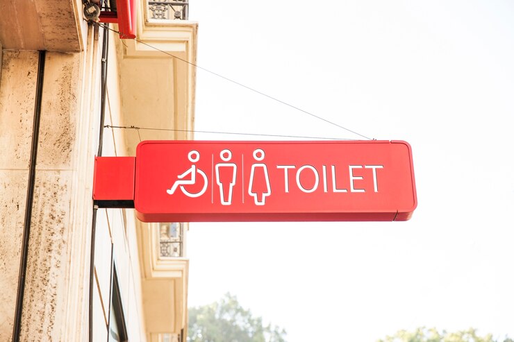 Photo gratuit panneau wc dans la ville