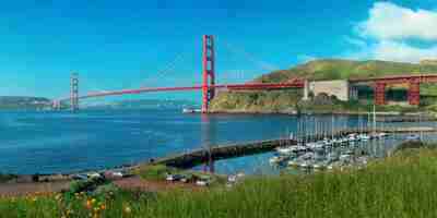 Photo gratuite panorama du golden gate bridge à san francisco avec baie et bateau