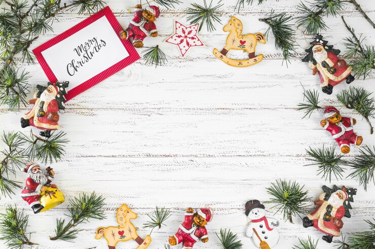 Photo gratuit papier avec inscription joyeux noël avec des jouets