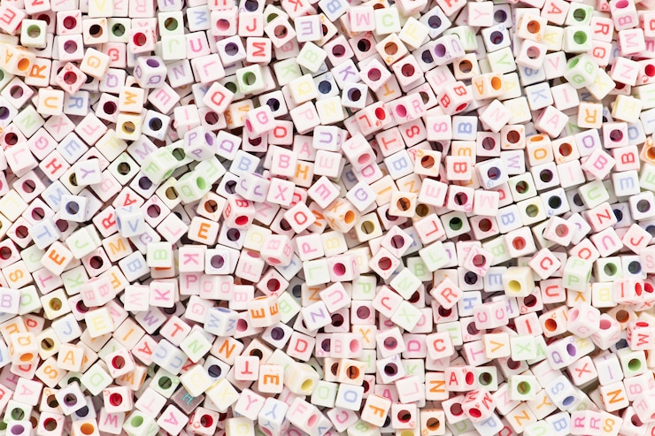 Photo gratuit papier peint perles de lettres anglaises blanches