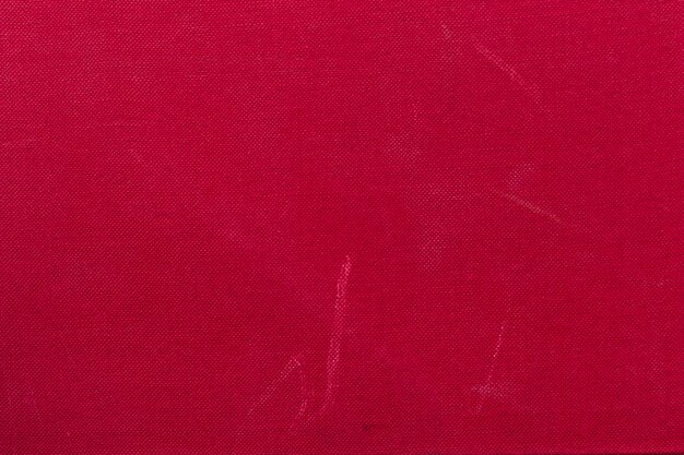 Papier peint de texture brillante du livre à couverture rigide rouge