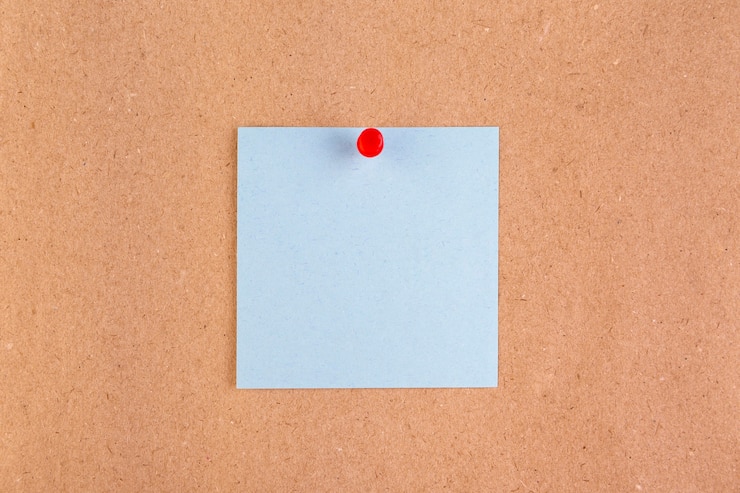 Photo gratuit papier vue de dessus avec des épingles