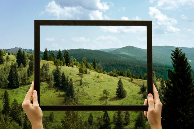 Paysage naturel avec cadre de maintien de la main