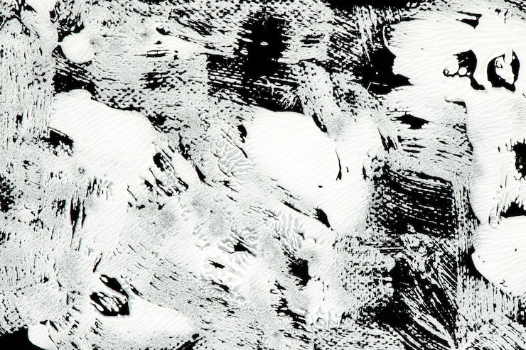 Photo gratuit peinture blanche sur noir