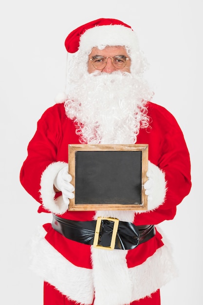 Père Noël avec tableau noir vide