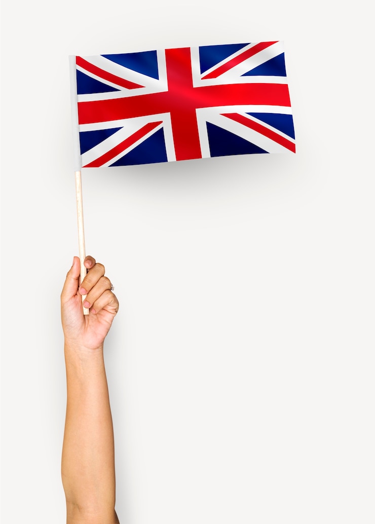 Photo gratuit personne agitant le drapeau du royaume-uni de grande-bretagne et d&#39;irlande du nord