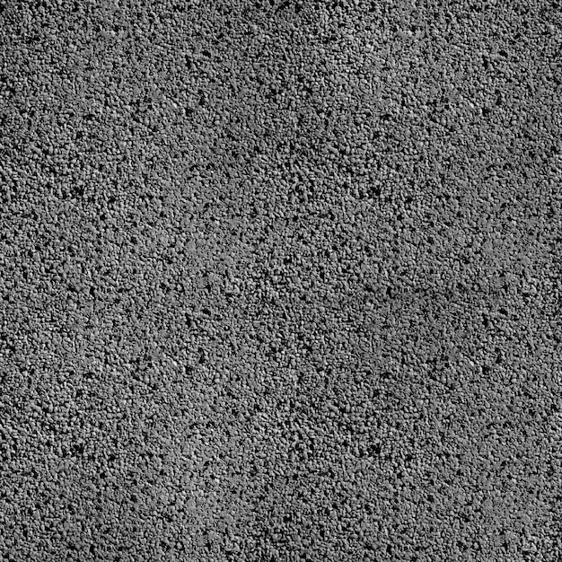 Photo gratuite petit noir modèle de mur gris pointillé