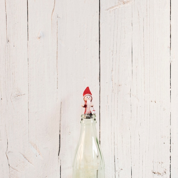 Petit Père Noël avec fond en bois blanc