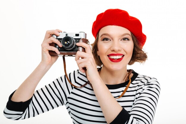 Photographe femme isolée sur blanc