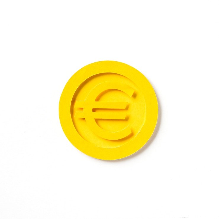 Photo gratuit pièce de monnaie européenne en or doré