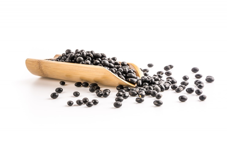 Photo gratuit pile de haricots noirs