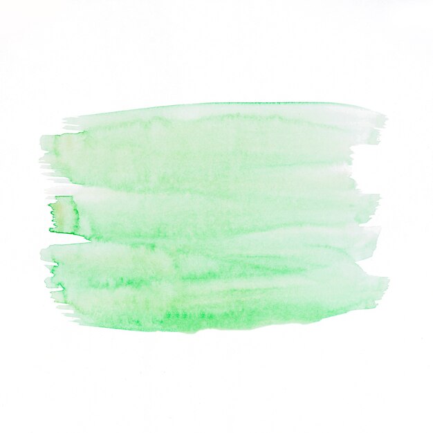 Pinceau aquarelle vert stokes sur fond blanc