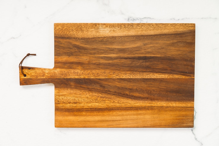 Photo gratuit planche à découper en bois