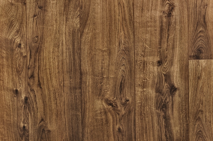 Photo gratuit plancher en bois brun fond texturé