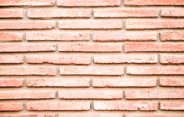 Plein cadre de mur de briques rouges