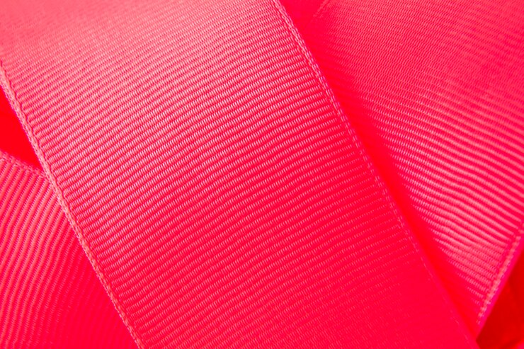 Photo gratuit plein cadre de ruban rouge