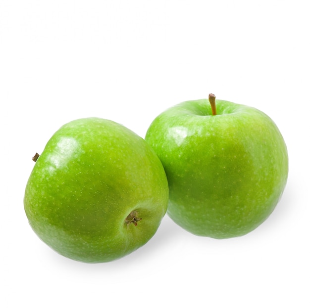 Pomme verte isolée sur blanc