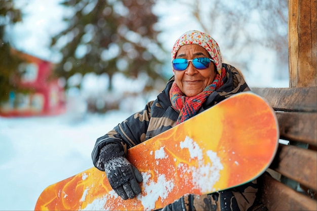 Photo gratuite portrait d'un adulte faisant du snowboard