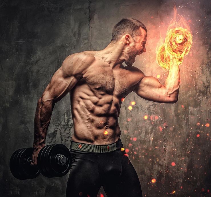 Photo gratuit portrait artistique d'un homme musclé torse nu avec haltère brûlant.