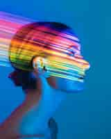 Photo gratuite portrait of person with rainbow colors symbolizing thoughts of the adhd brain