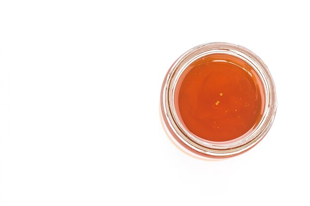 Pot en verre avec de la marmelade d&#39;orange