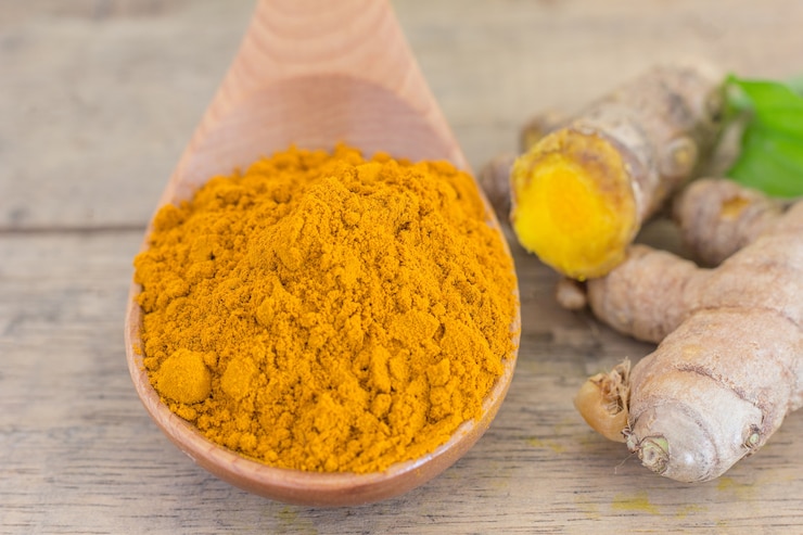 Photo gratuit poudre de curcuma