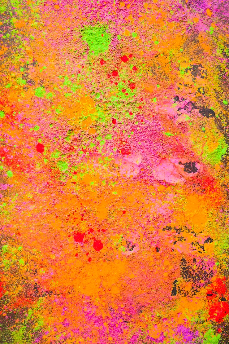 Photo gratuit poudre orange dispersée sur la table