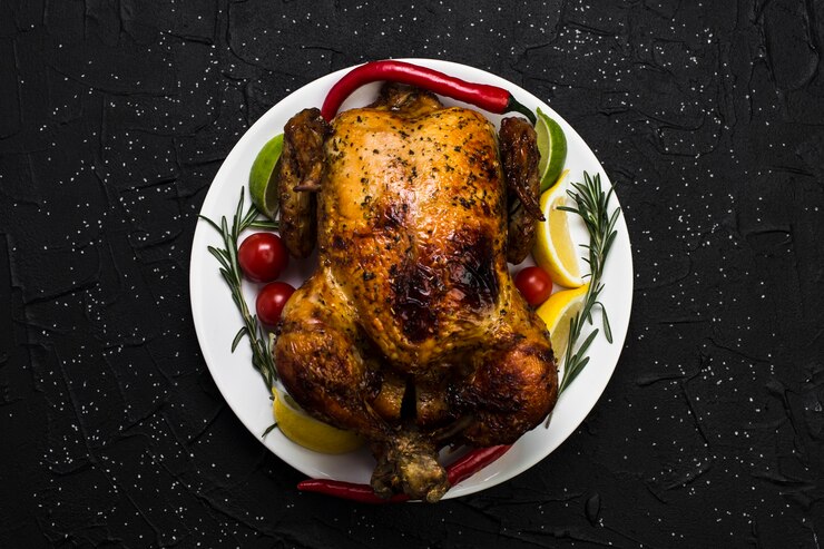 Photo gratuit poulet rôti aux épices sur fond gris