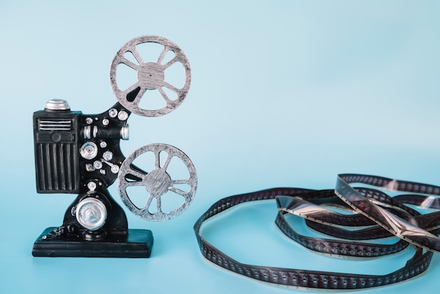 Photo gratuite projecteur de film avec bobine de cinéma