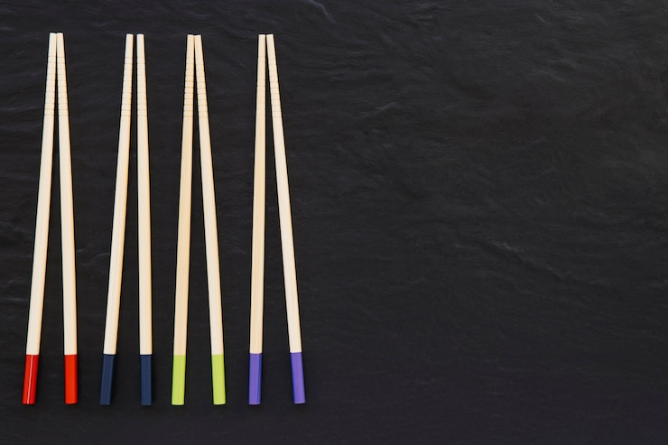 Photo gratuit quatre paires de baguettes